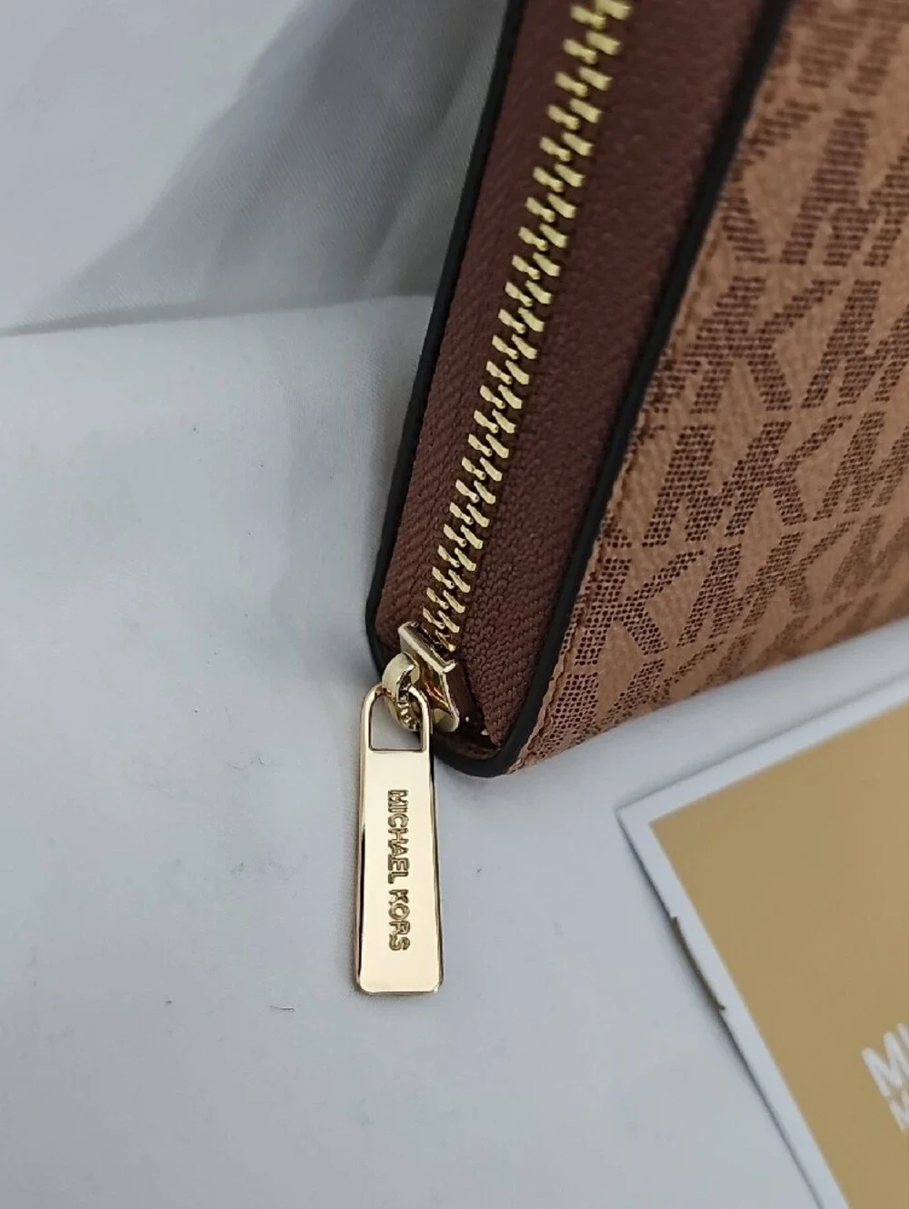 Michael Kors Brown MK Monogram Zip Wallet with Gold Hardware